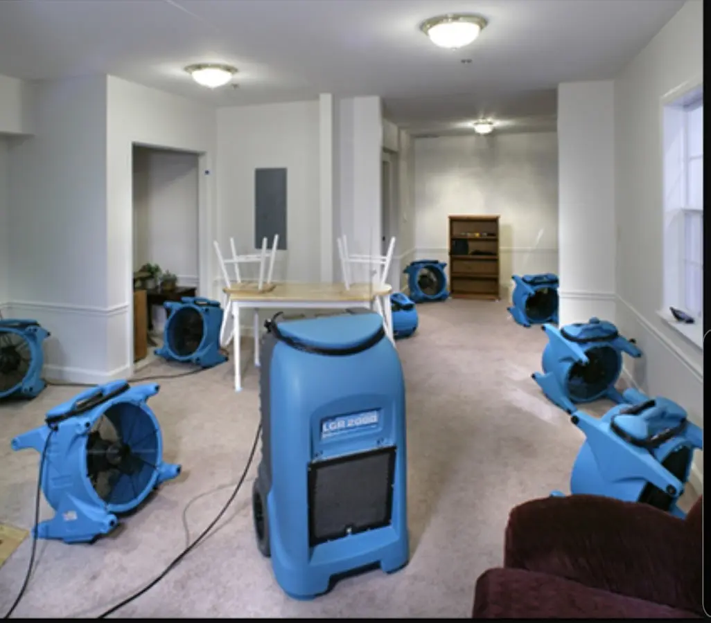 Air movers and dehumidifier setup for Water Extraction & Removal in Starkville